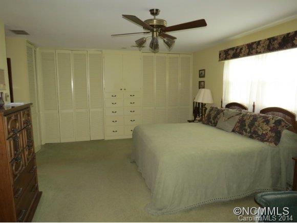 718 Union Road Rutherfordton, NC 28139 - Photo 11 of 24 a bedroom with a bed and a flat screen tv