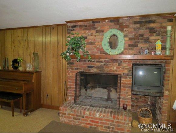 718 Union Road Rutherfordton, NC 28139 - Photo 22 of 24 a living room with a fireplace