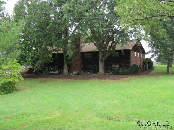 718 Union Road Rutherfordton, NC 28139 - Photo 4 of 24 a backyard of a house with plants and large tree