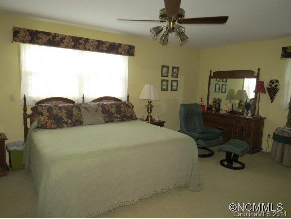 718 Union Road Rutherfordton, NC 28139 - Photo 10 of 24 a bedroom with a bed dresser and window
