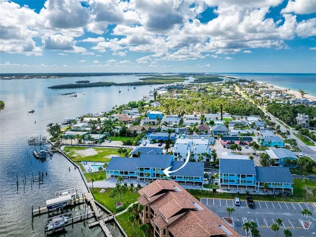 a view of a chairs and table in a patio