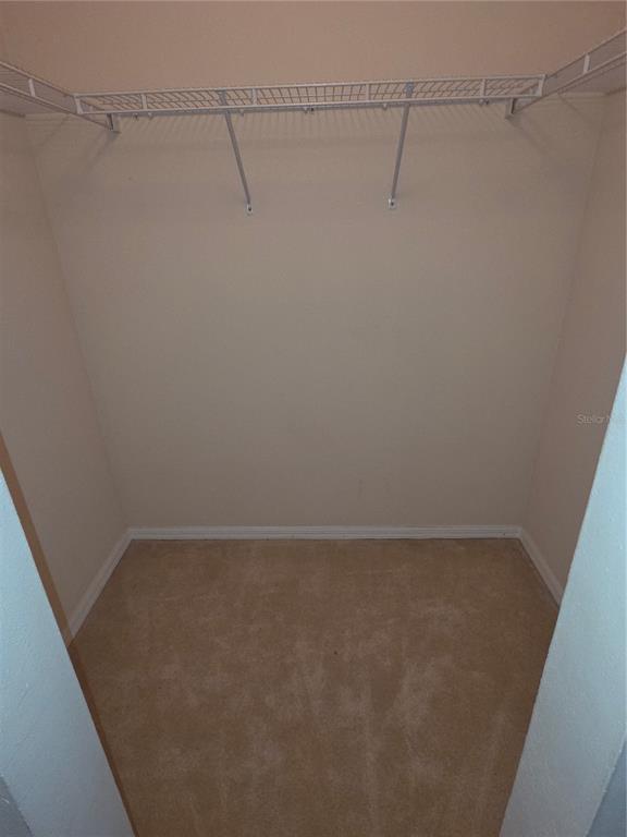 10563 Marysville Street Spring Hill, FL 34608 - Photo 12 of 22 a view of a room with racks on the wall