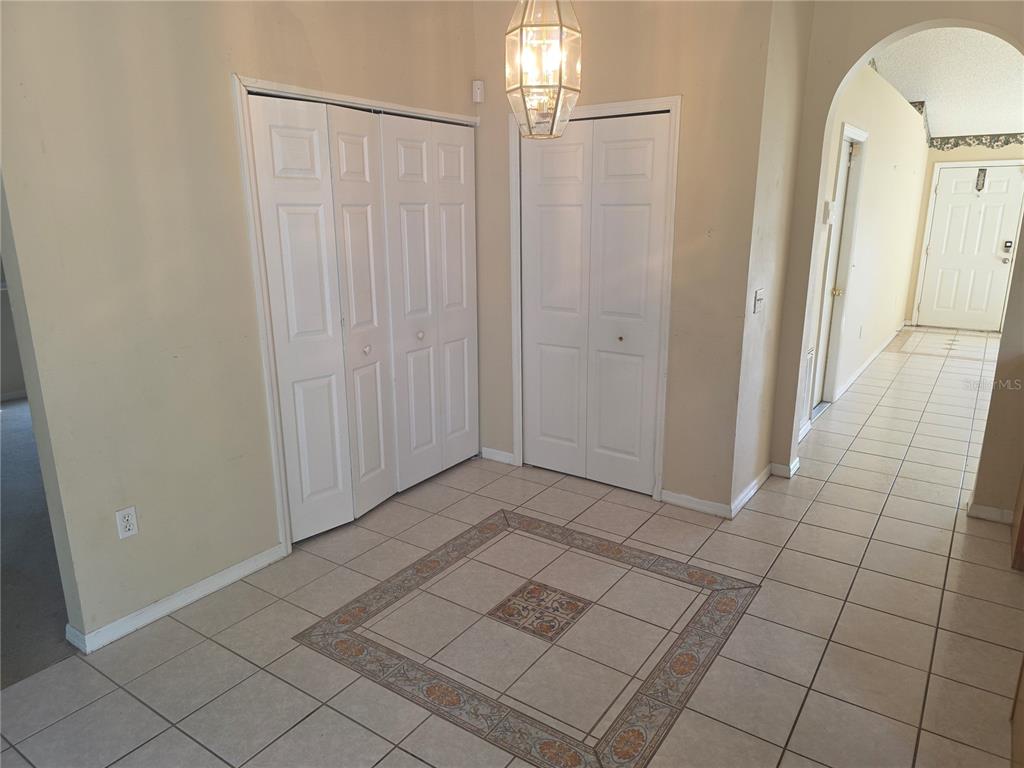 10563 Marysville Street Spring Hill, FL 34608 - Photo 5 of 22 a view of a hallway
