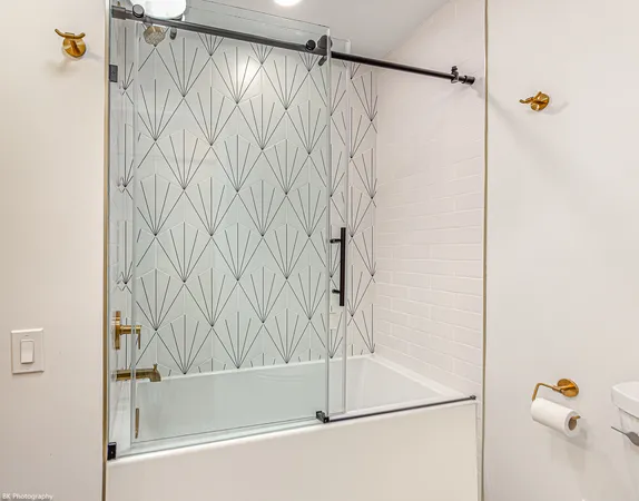 a bathroom with a shower and a shower