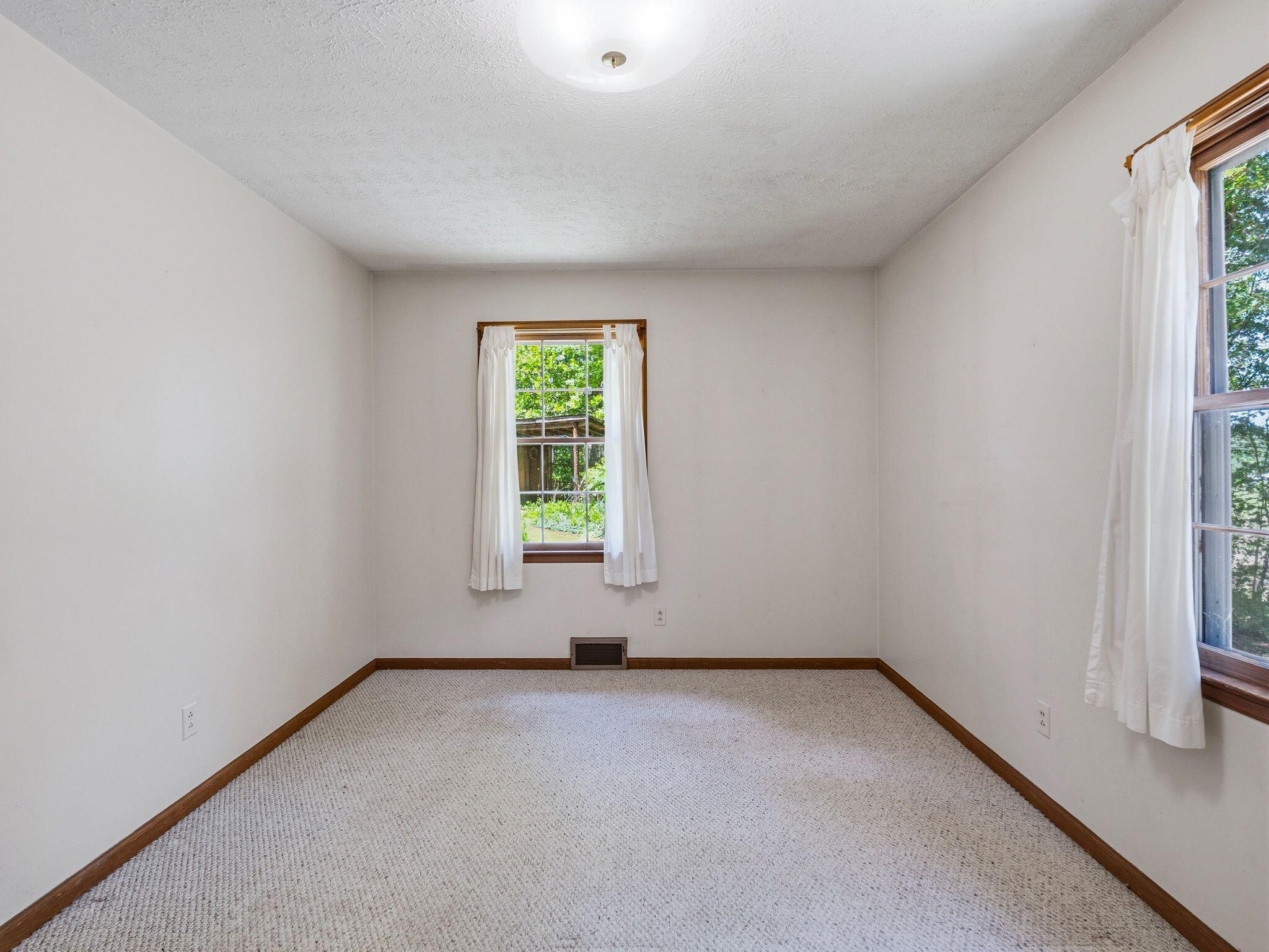 1115 Robin Ridge Road Henry, VA 24102 - Photo 20 of 54 an empty room with a window