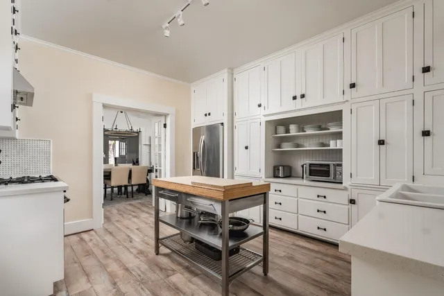 a bed room with a bed and furniture