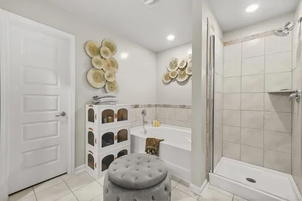 a bathroom with a shower and a sink