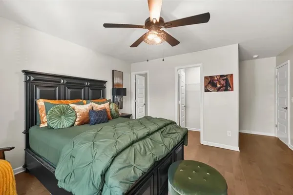 a living room with a bed and a couch