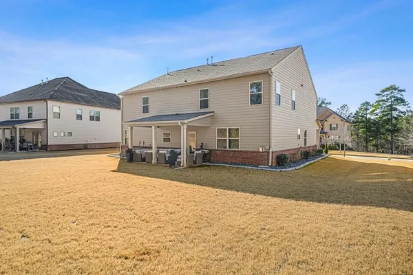 an aerial view of a house with a mountain view