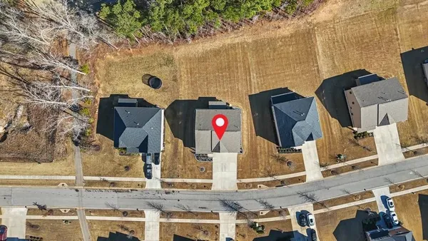 an aerial view of residential building and lake view