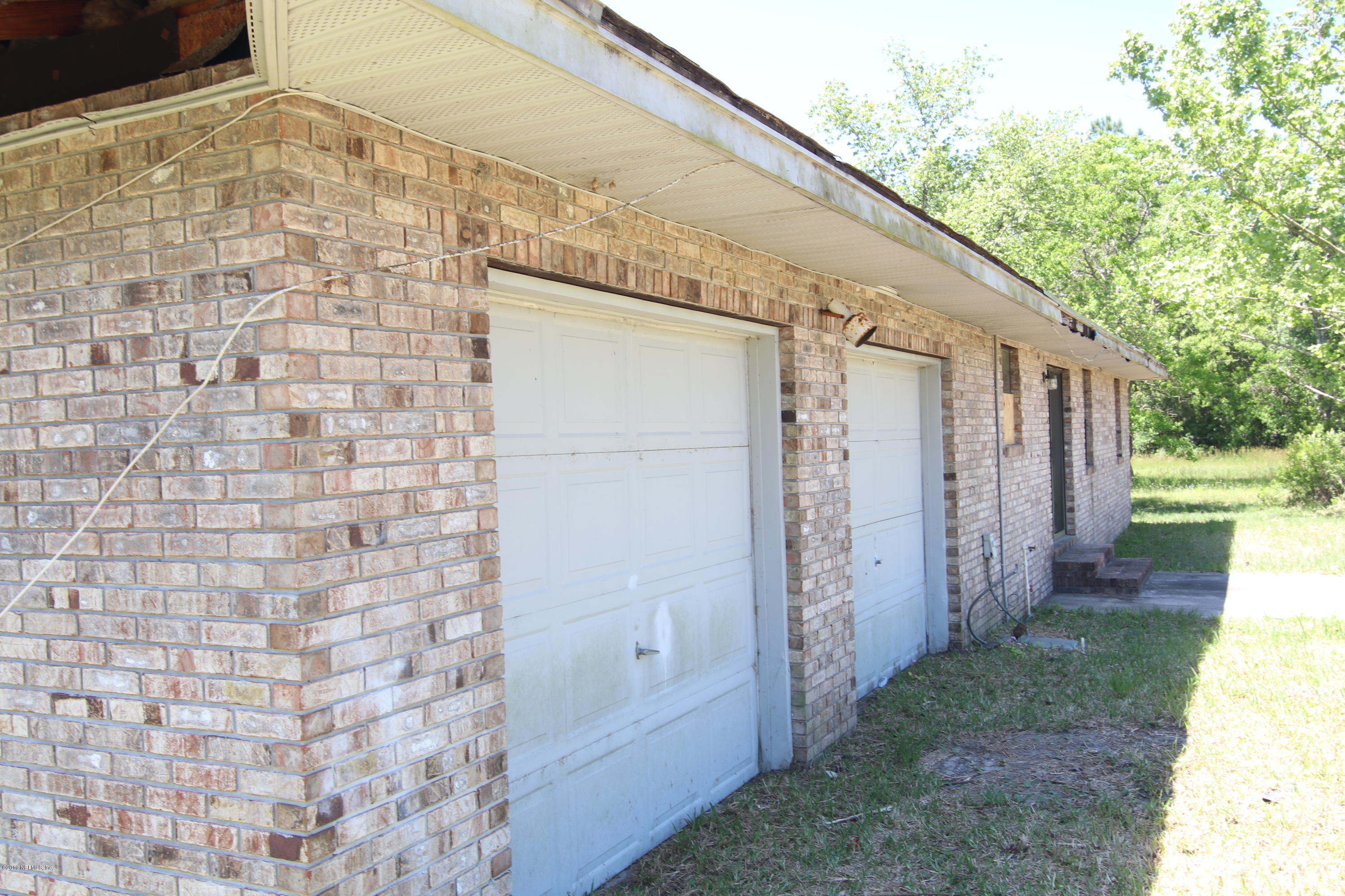 54344 Hurst Road Callahan, FL 32011 - Photo 16 of 55 a backyard of a house with lots of green space