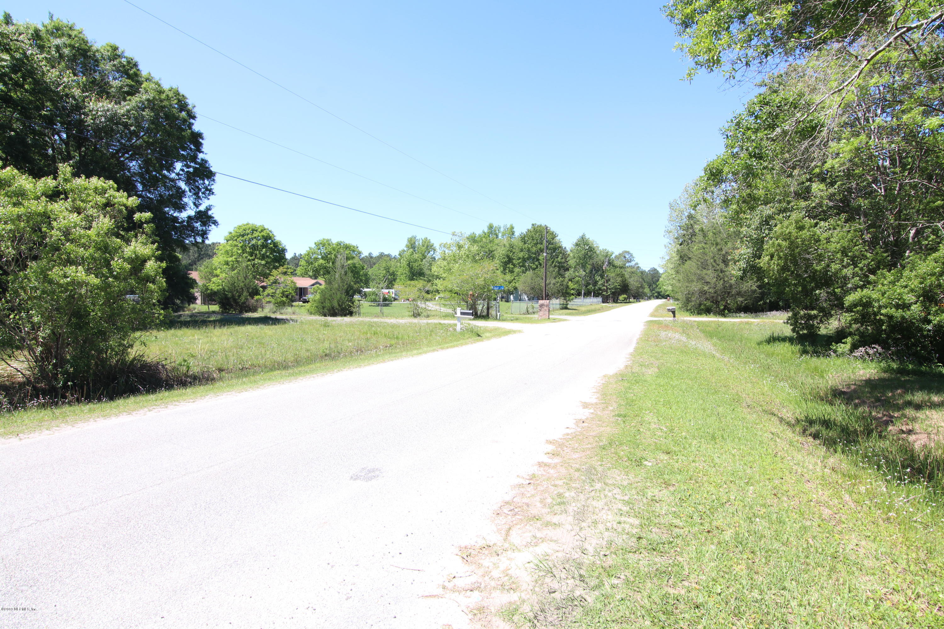 54344 Hurst Road Callahan, FL 32011 - Photo 24 of 55 a view of a yard with a tree