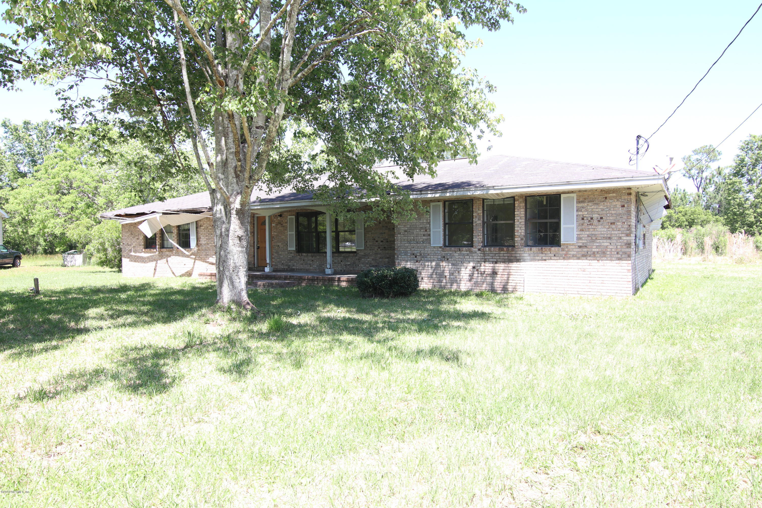 54344 Hurst Road Callahan, FL 32011 - Photo 3 of 55 a front view of house with yard
