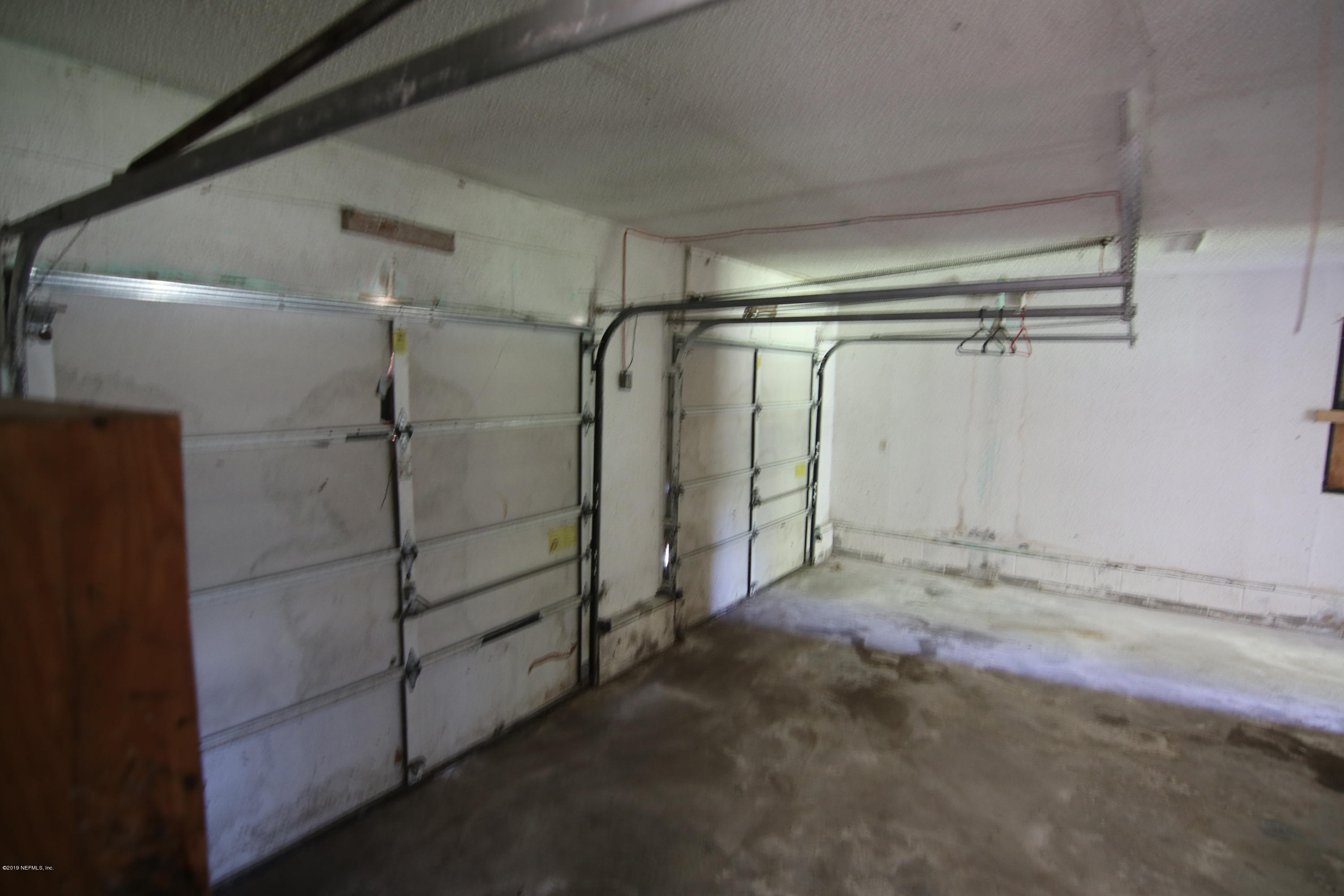 54344 Hurst Road Callahan, FL 32011 - Photo 34 of 55 a view of a room with racks on the wall