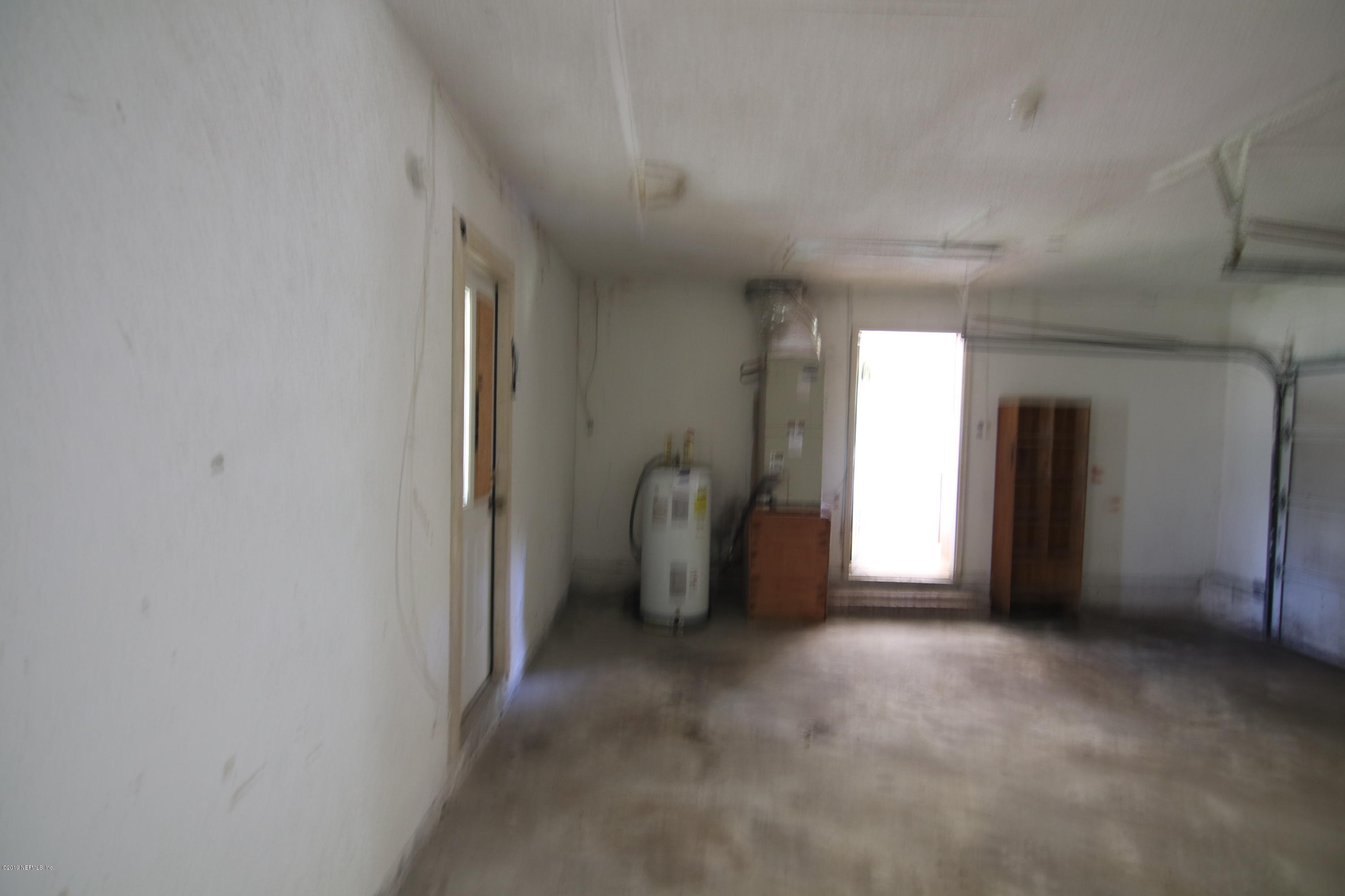 54344 Hurst Road Callahan, FL 32011 - Photo 39 of 55 a view of empty room with a fireplace