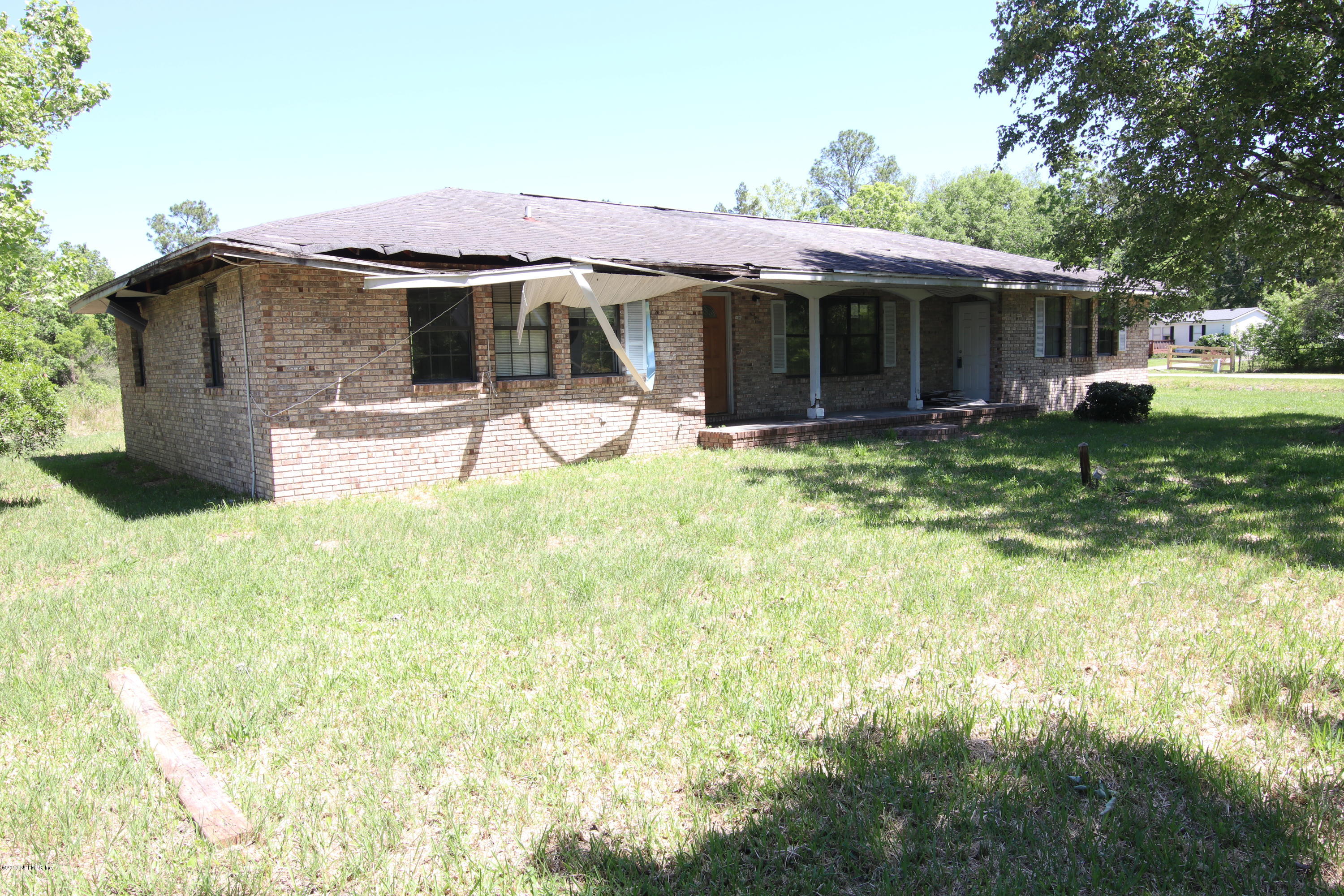 54344 Hurst Road Callahan, FL 32011 - Photo 5 of 55 a view of a house with a yard and sitting area
