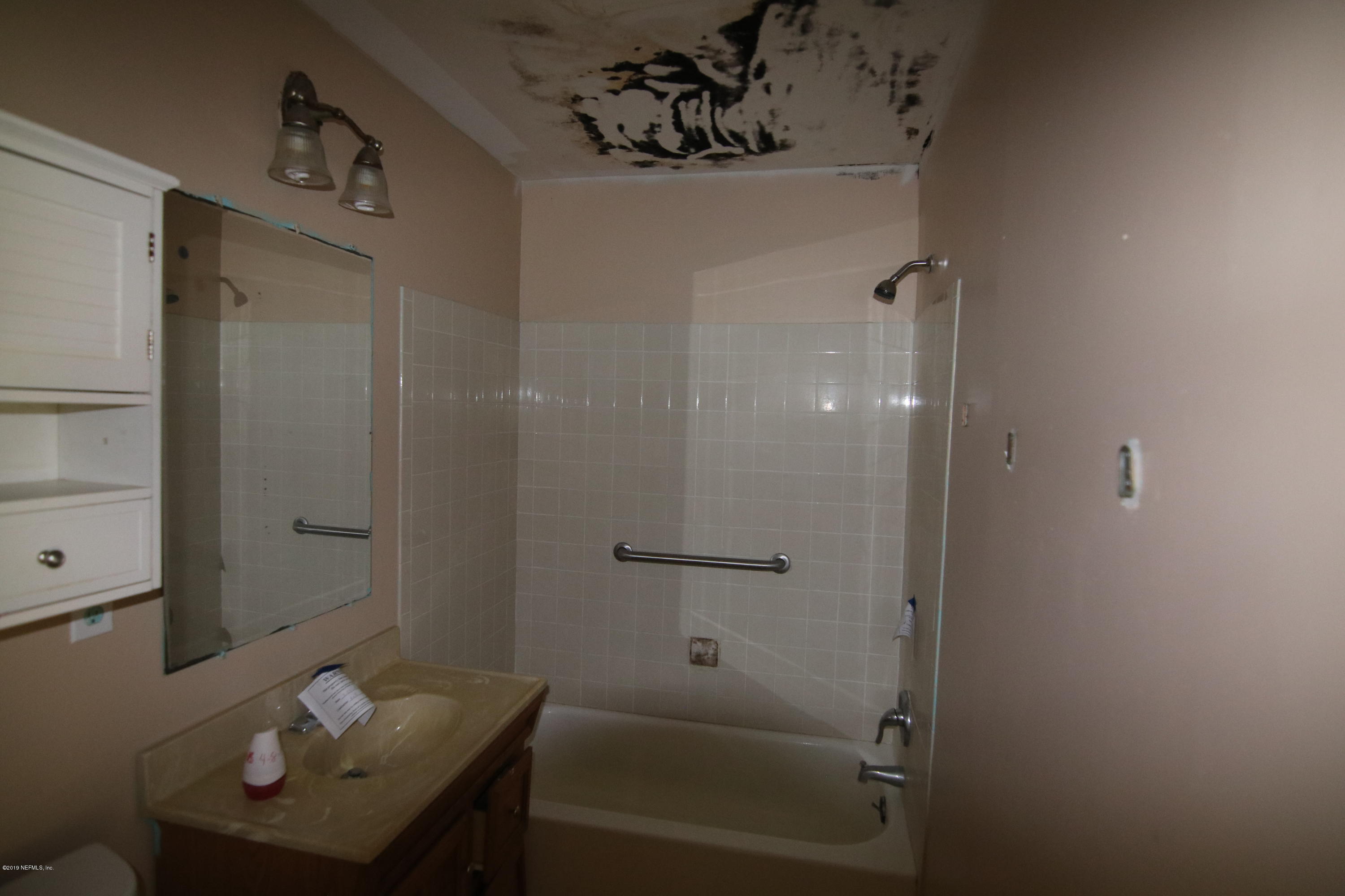 54344 Hurst Road Callahan, FL 32011 - Photo 51 of 55 a bathroom with a shower