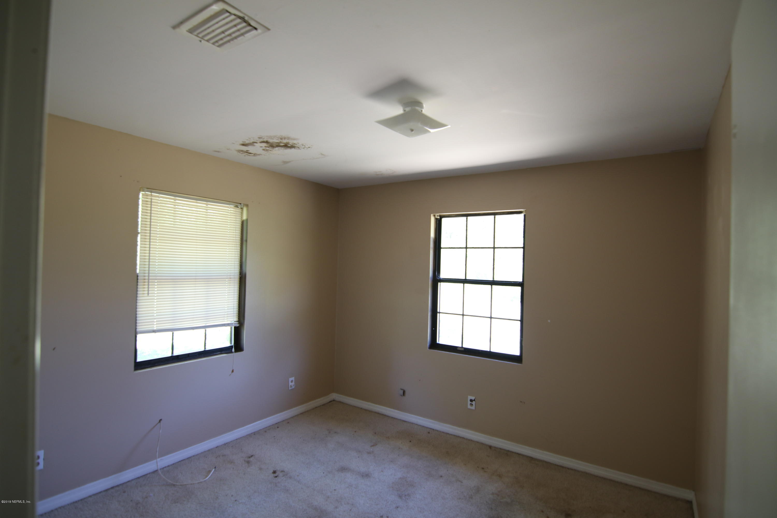54344 Hurst Road Callahan, FL 32011 - Photo 53 of 55 an empty room with windows