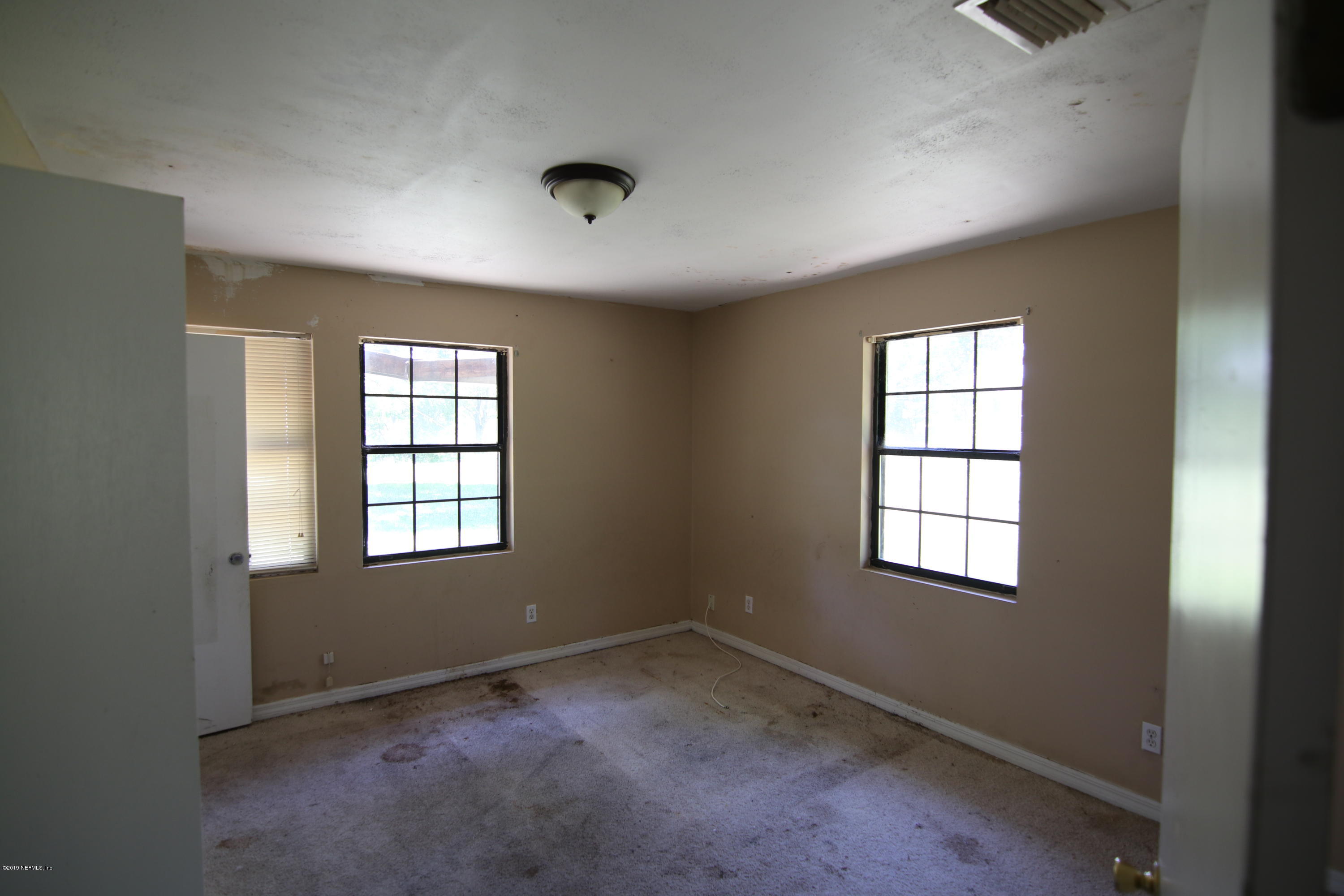 54344 Hurst Road Callahan, FL 32011 - Photo 54 of 55 an empty room with windows