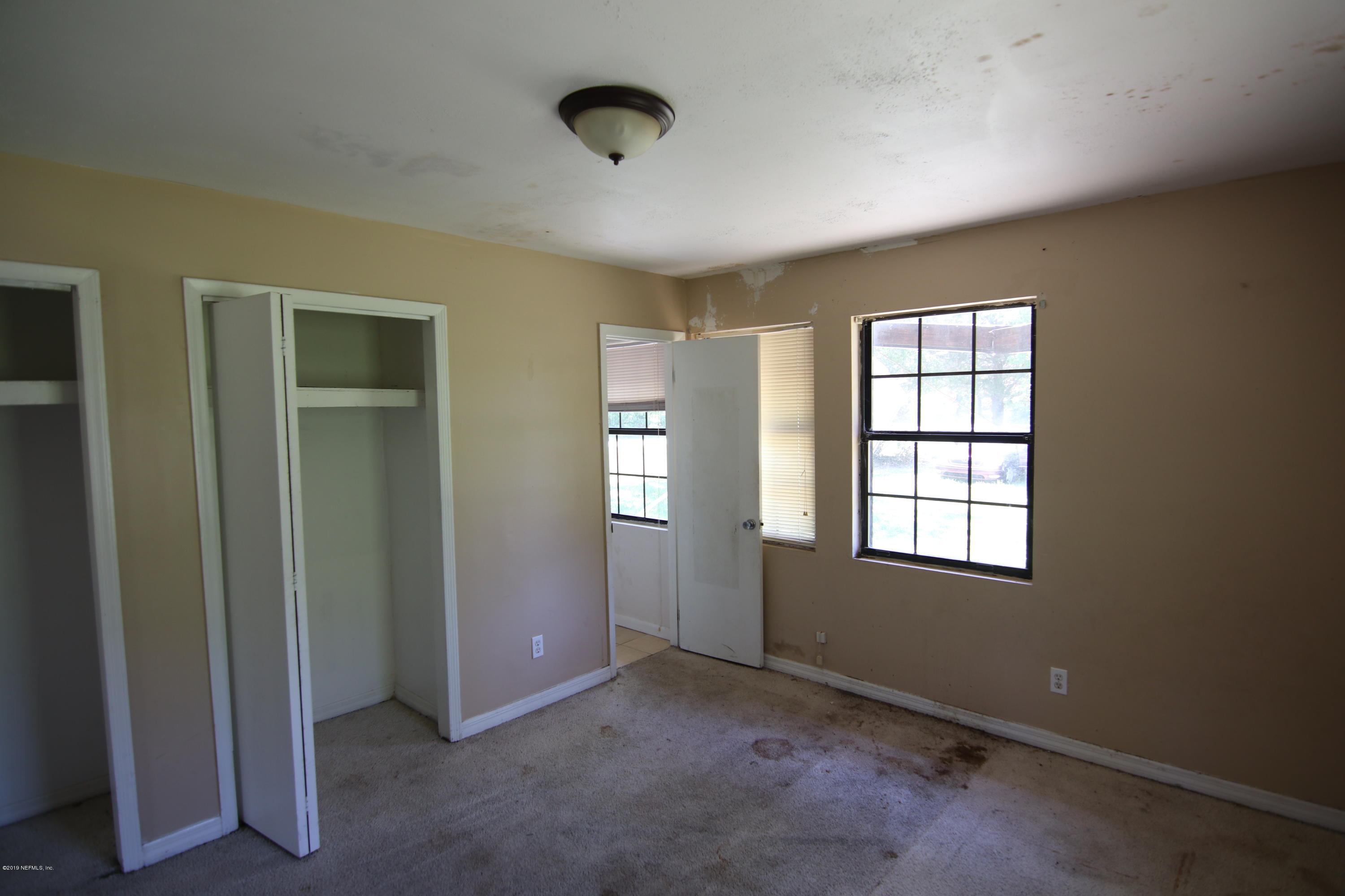 54344 Hurst Road Callahan, FL 32011 - Photo 55 of 55 an empty room with windows