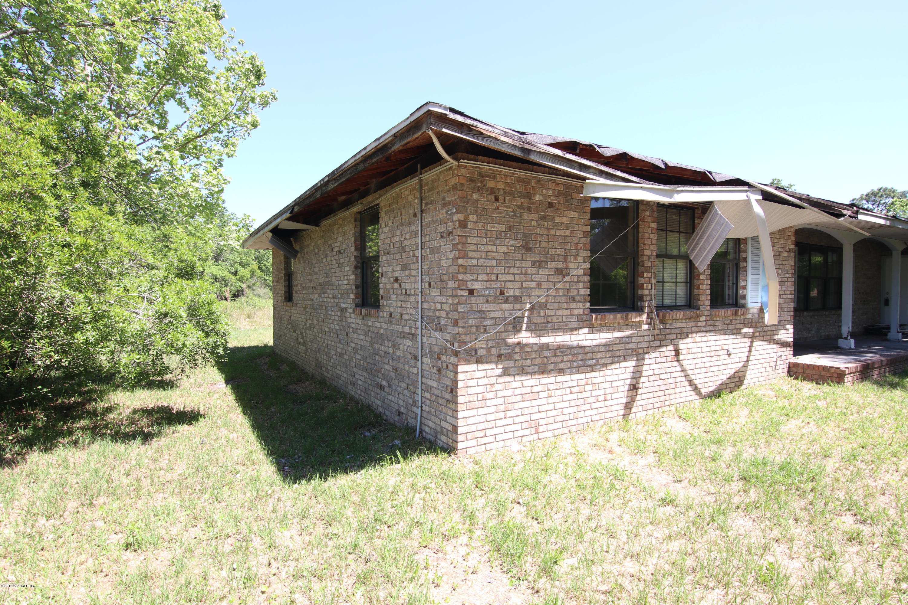 54344 Hurst Road Callahan, FL 32011 - Photo 6 of 55 a view of a house with snow on the wall