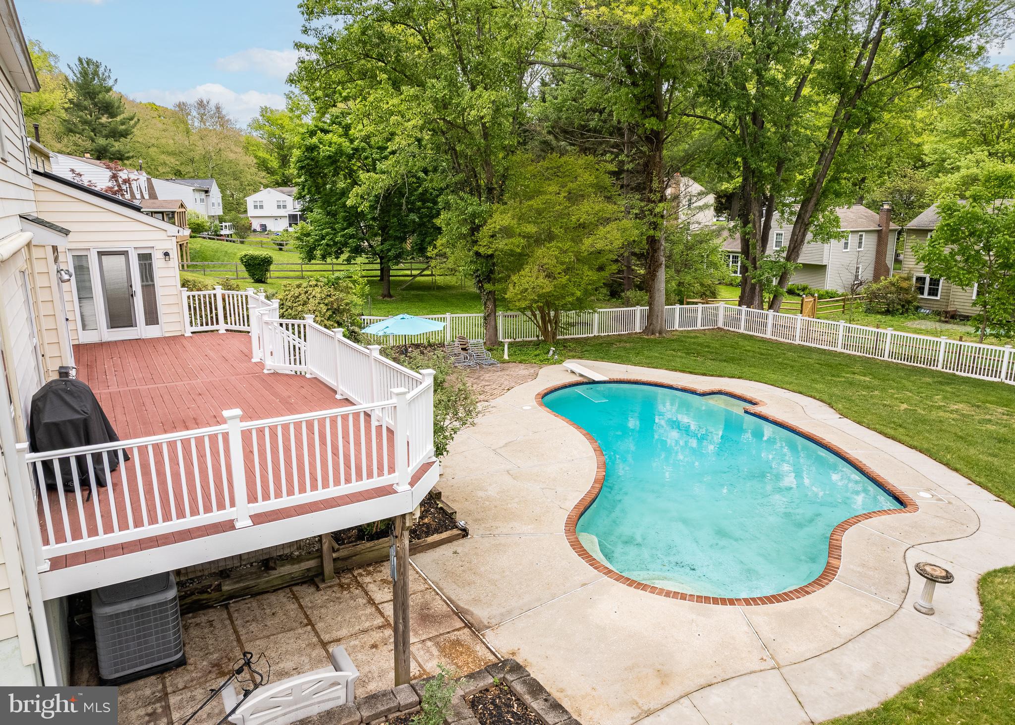 4945 West Running Brook Road Columbia, MD 21044 - Photo 53 of 65 Concrete surrounded pool area