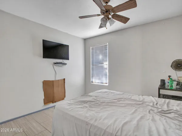 a view of a swimming pool with a yard