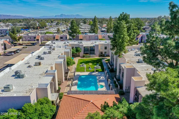 a view of a car parked in front of a building