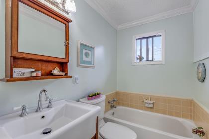 17959 Pesante Road Salinas, CA 93907 - Photo 18 of 24 a bathroom with a sink and a bathtub