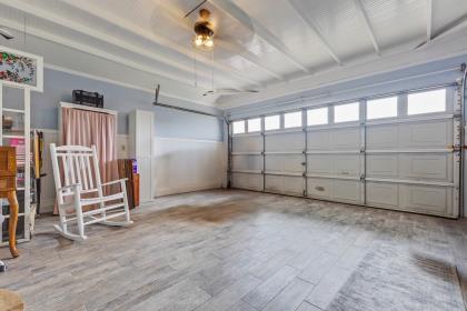 17959 Pesante Road Salinas, CA 93907 - Photo 19 of 24 an empty room with wooden floor and windows