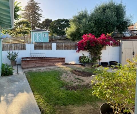 17959 Pesante Road Salinas, CA 93907 - Photo 6 of 24 a view of a house with a backyard and a garden