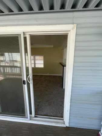 a view of a entryway door of the house