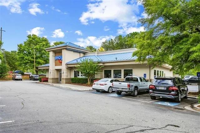 a car parked in front of a house