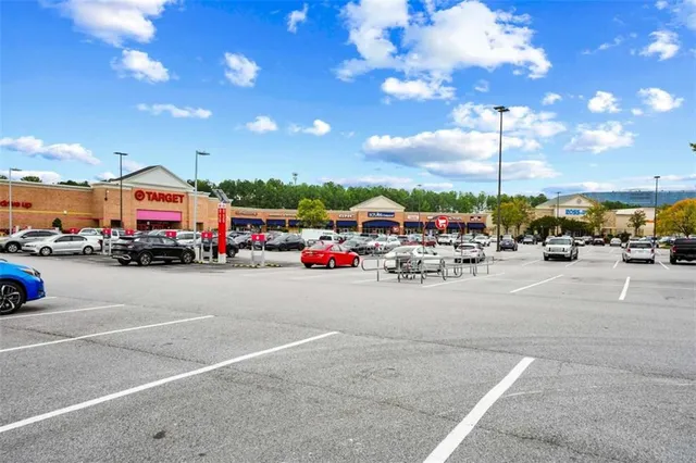 a view of a city street with cars