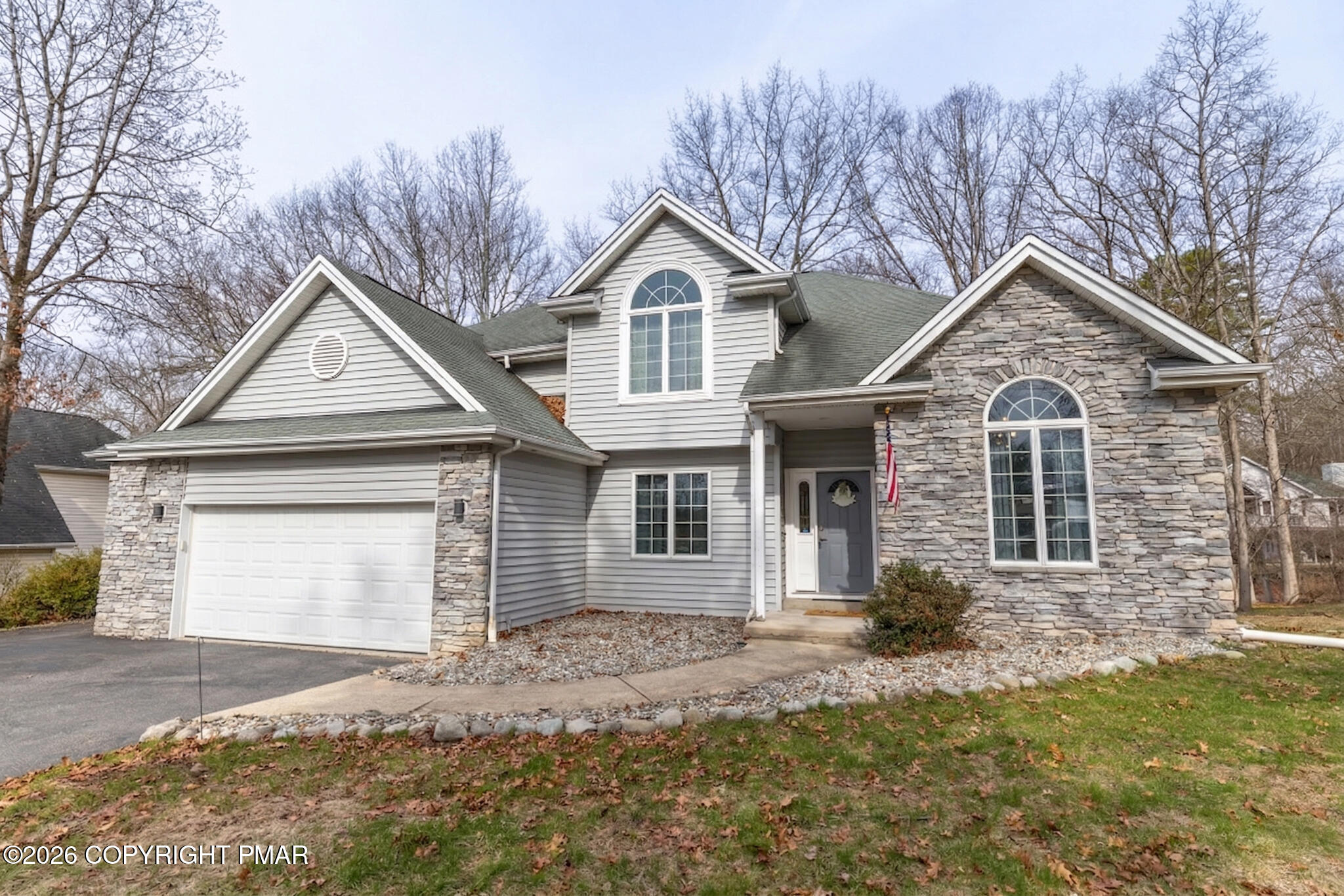 207 Hawks Nest Road East Stroudsburg, PA 18302 - Photo 1 of 46 Front of house Spring