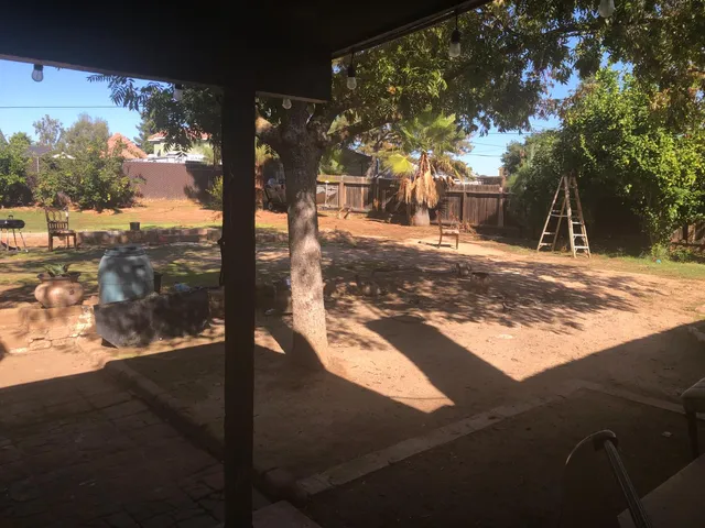 a view of road with view of a yard