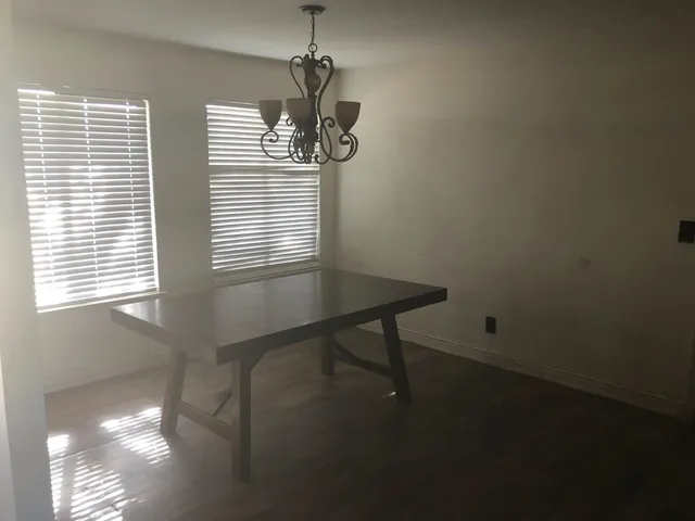 a view of a dining room with a window