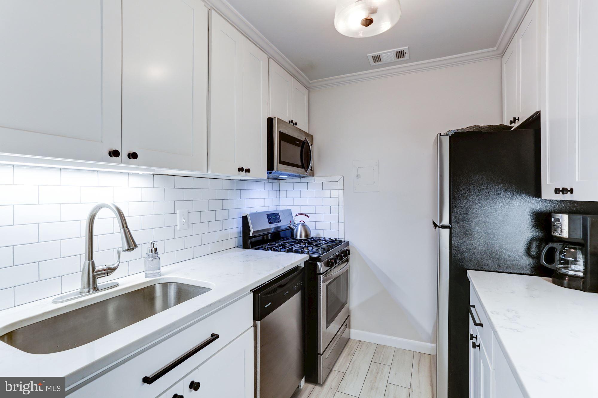 2711 Ordway Street Northwest, Unit 303 Washington, DC 20008 - Photo 6 of 37 Brand New Kitchen