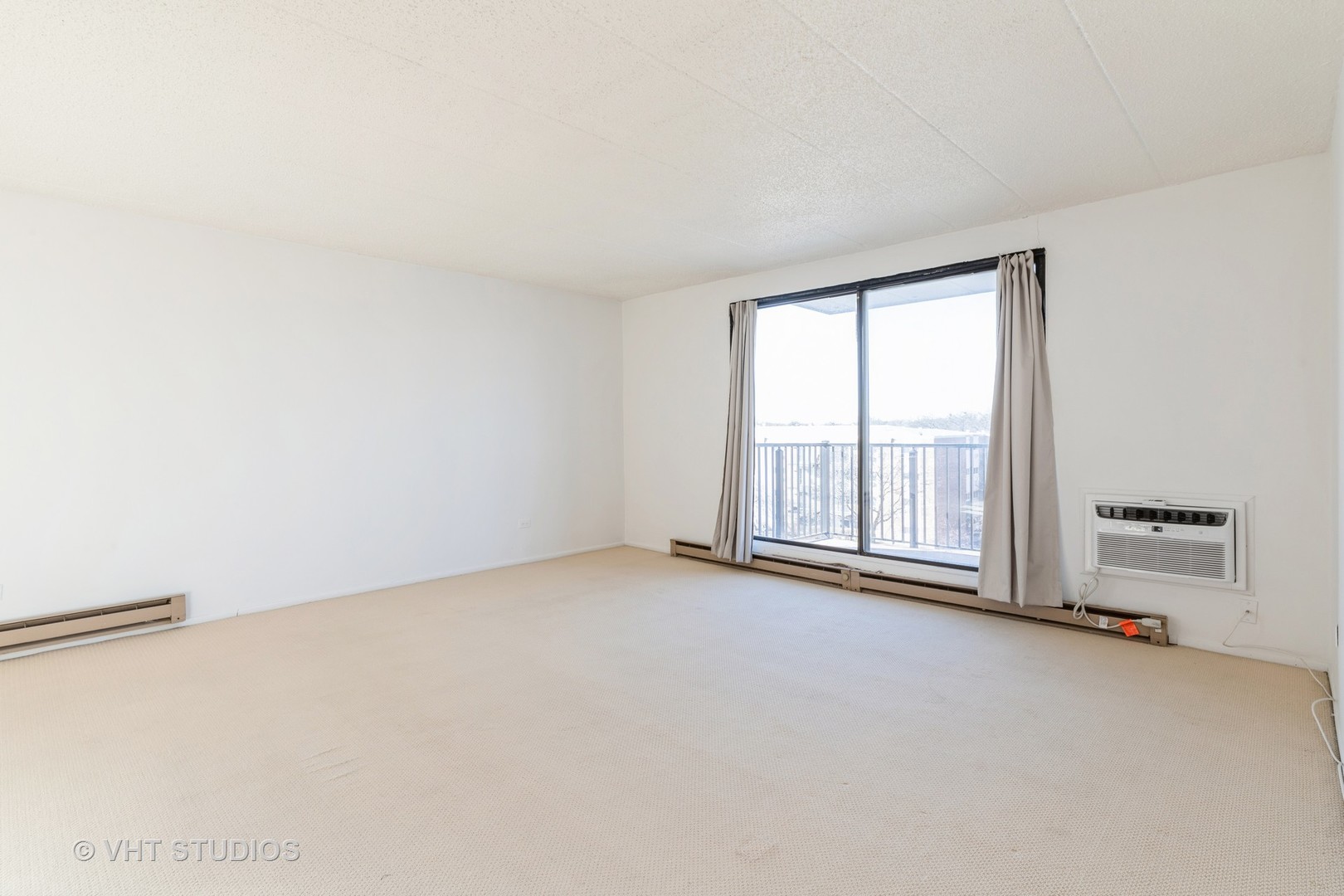 9701 North Dee Road, Unit 5M Niles, IL 60714 - Photo 2 of 21 an empty room with a empty space and windows