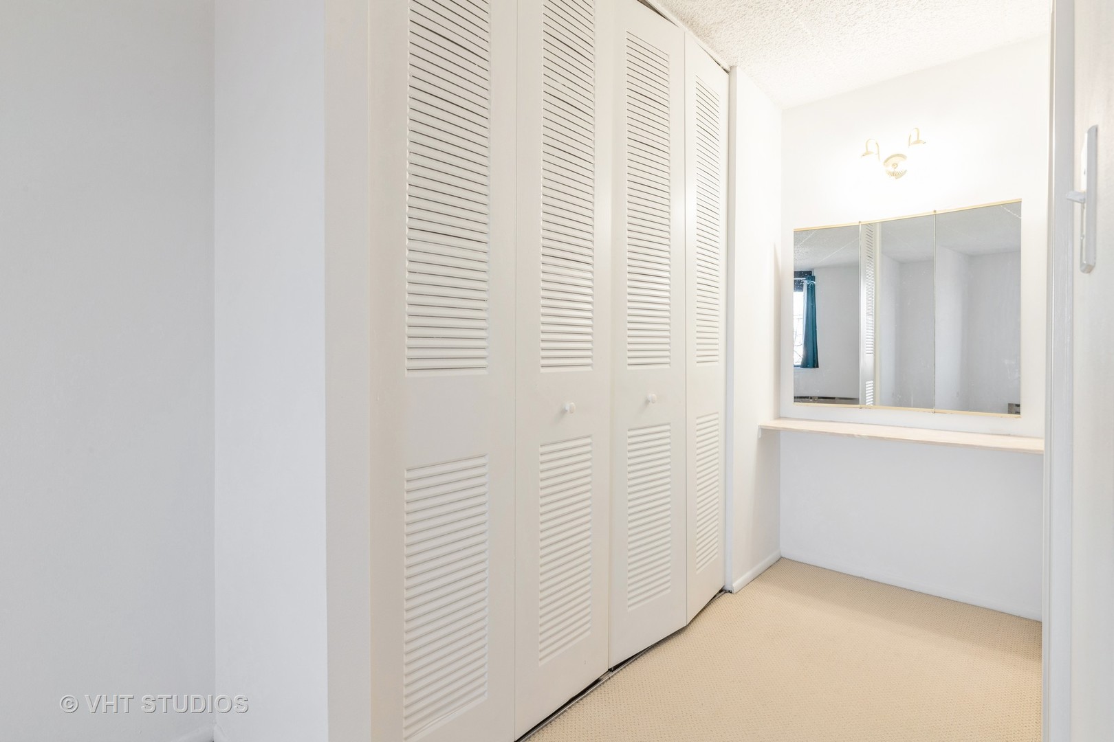 9701 North Dee Road, Unit 5M Niles, IL 60714 - Photo 8 of 21 an empty room with windows