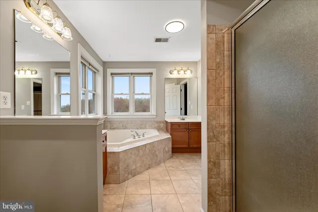 a view of a large body of water with a building in the background