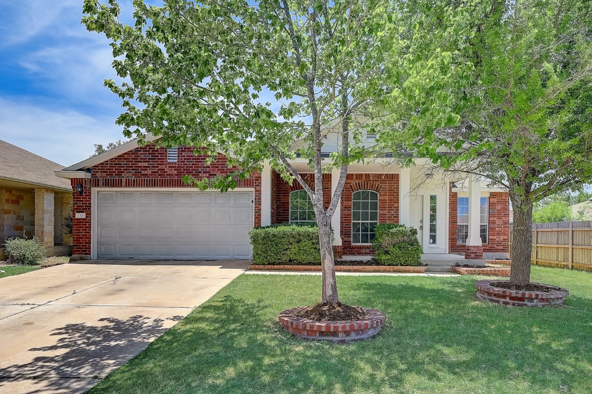 2305 Butler Way Round Rock, TX 78665 - Photo 1 of 1 a front view of a house with a yard