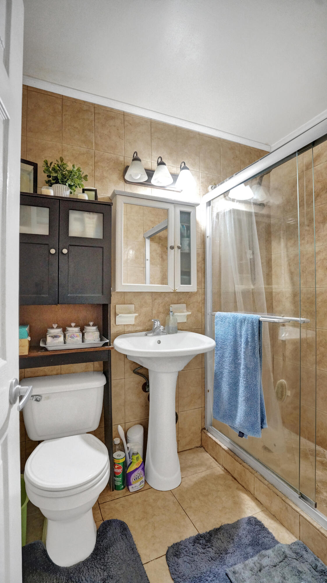 640 Northeast 24th Street Pompano Beach, FL 33064 - Photo 15 of 35 a bathroom with a sink toilet and mirror