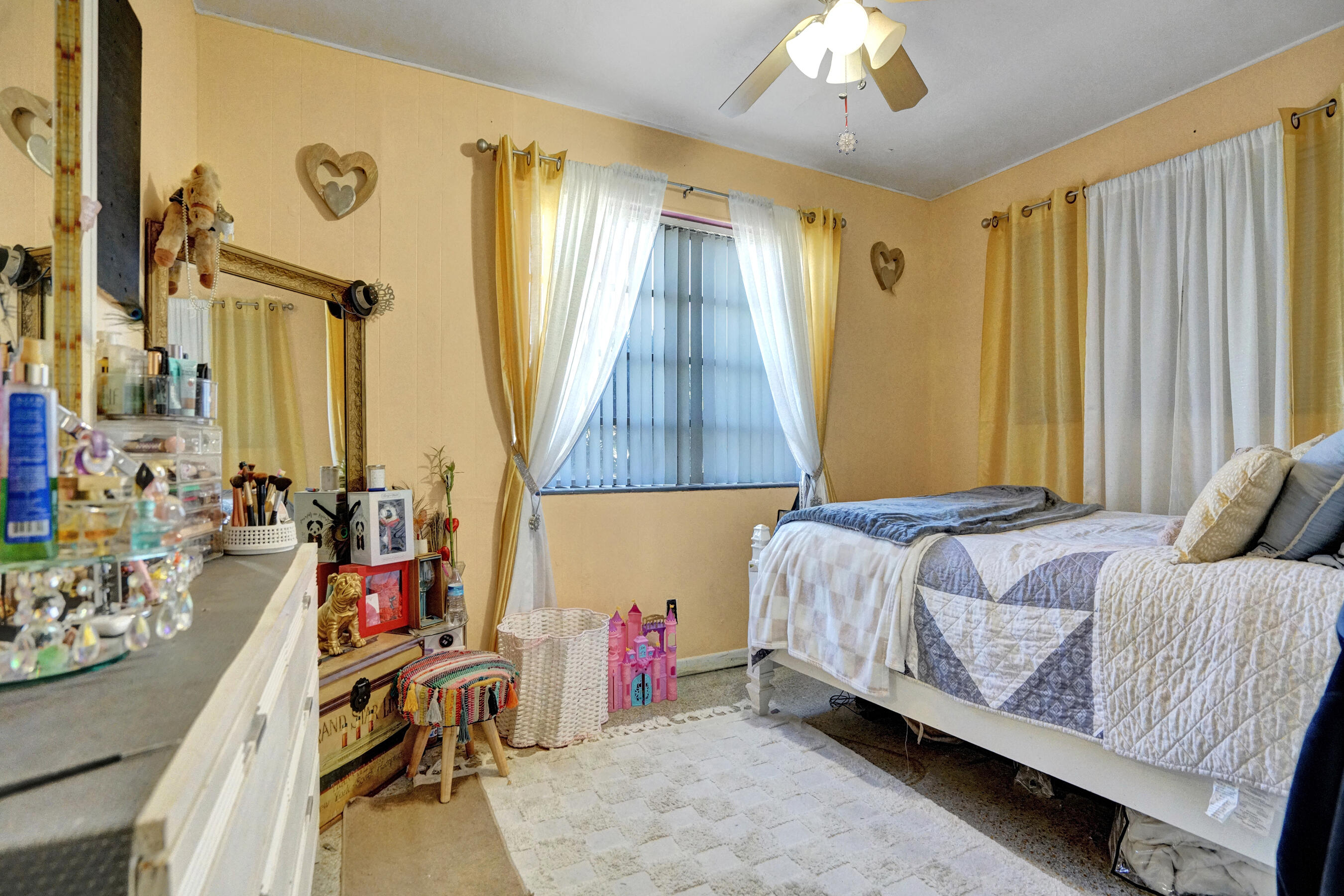 640 Northeast 24th Street Pompano Beach, FL 33064 - Photo 16 of 35 a bedroom with a bed and a dresser