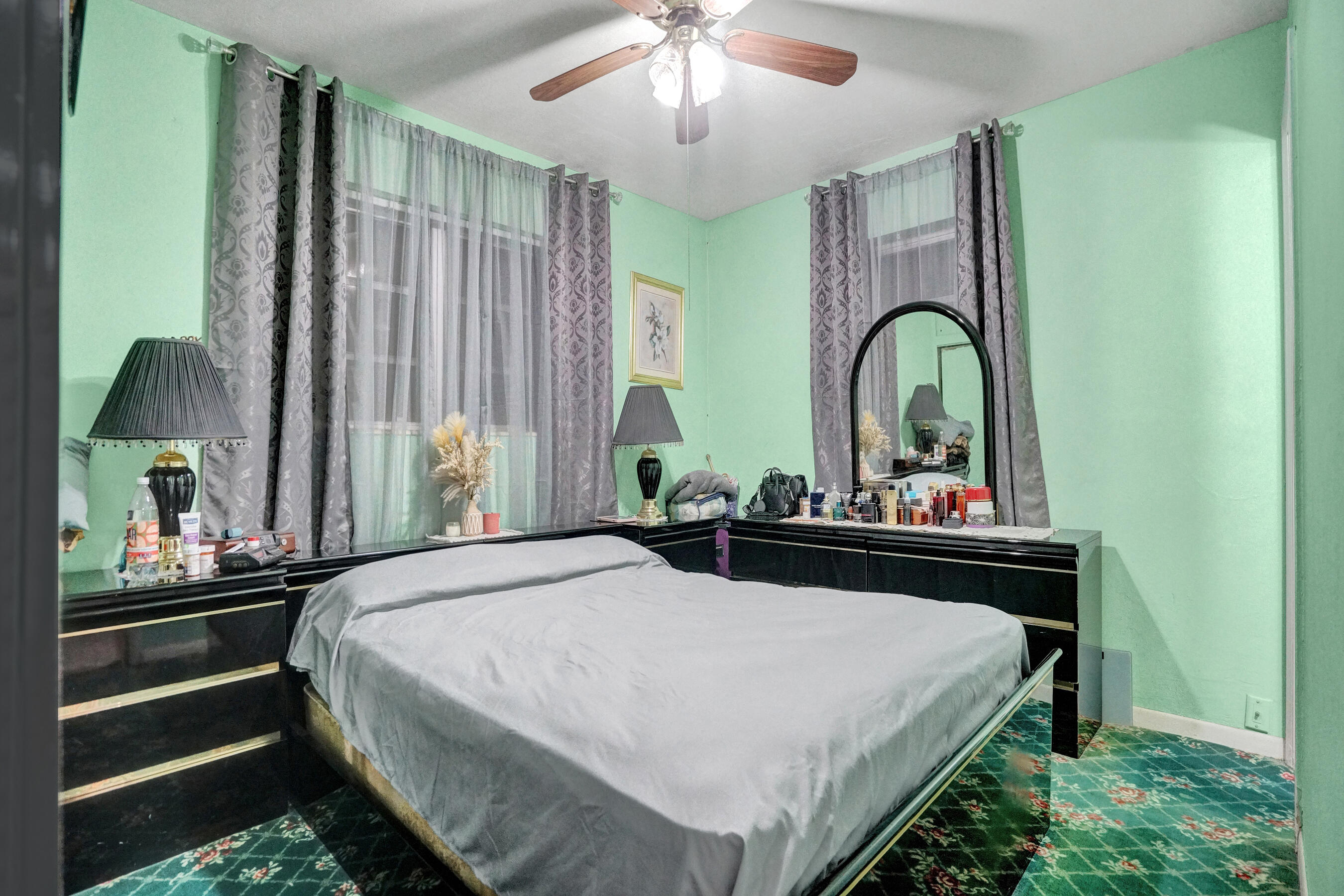 640 Northeast 24th Street Pompano Beach, FL 33064 - Photo 18 of 35 a bedroom with a bed and a dresser