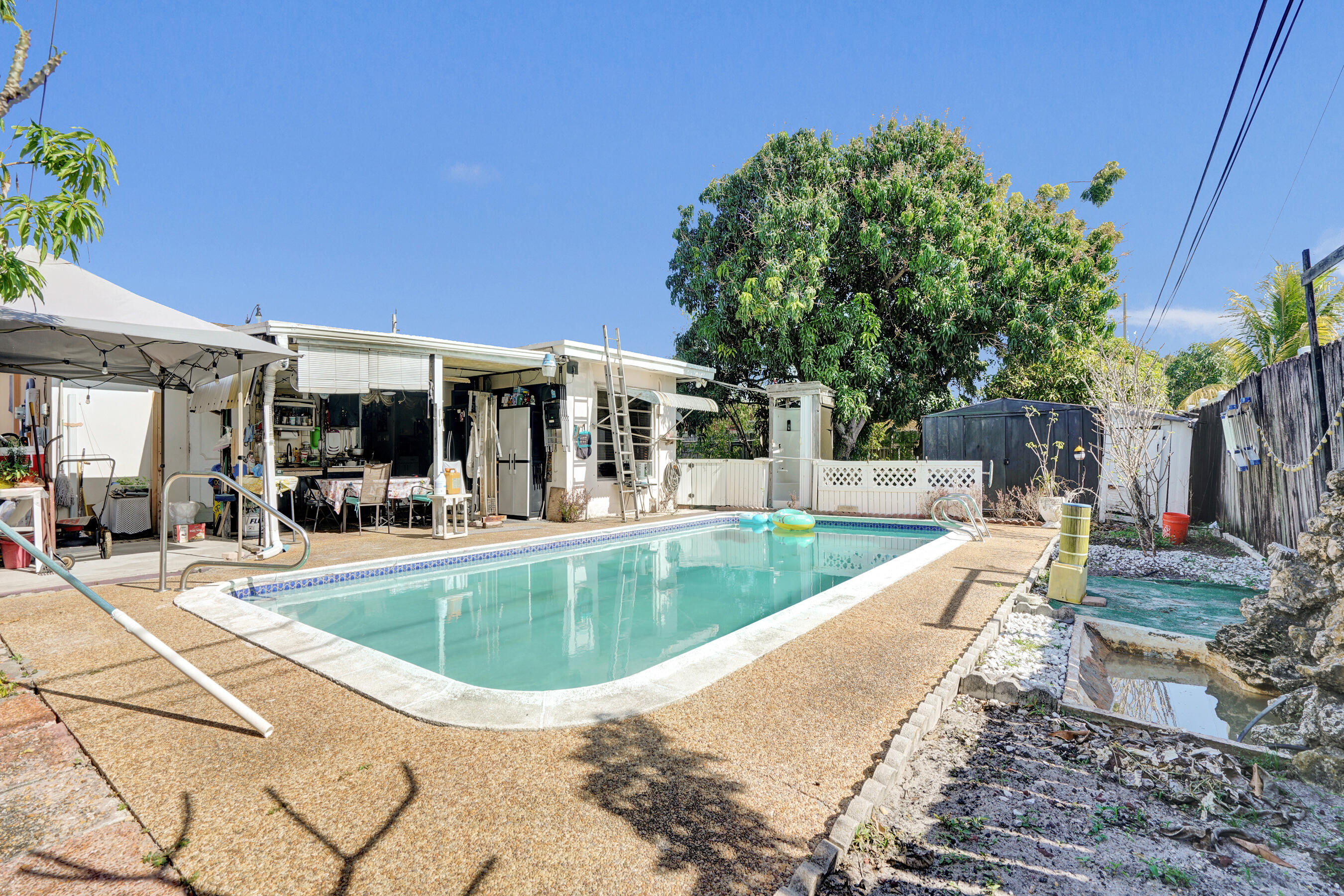 640 Northeast 24th Street Pompano Beach, FL 33064 - Photo 27 of 35 a view of outdoor space yard swimming pool and patio