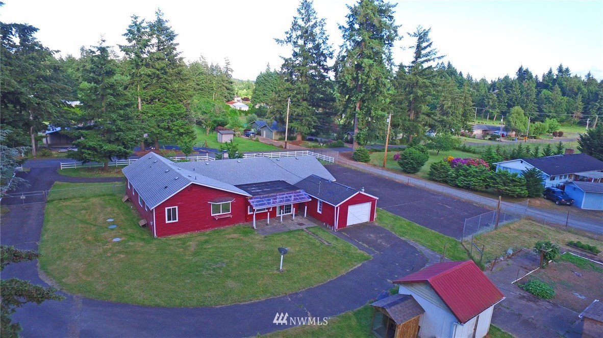 19215 Loganberry Street Southwest Rochester, WA 98579 - Photo 2 of 38 an aerial view of an outdoor space pool patio and outdoor seating
