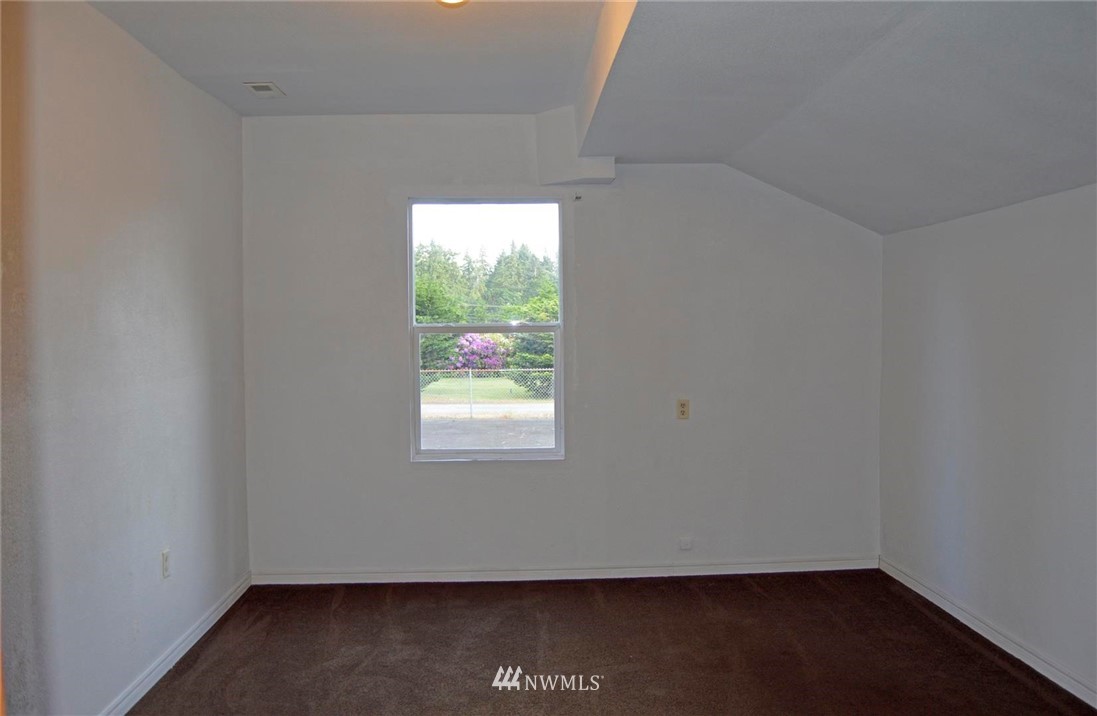 19215 Loganberry Street Southwest Rochester, WA 98579 - Photo 26 of 38 an empty room with a window