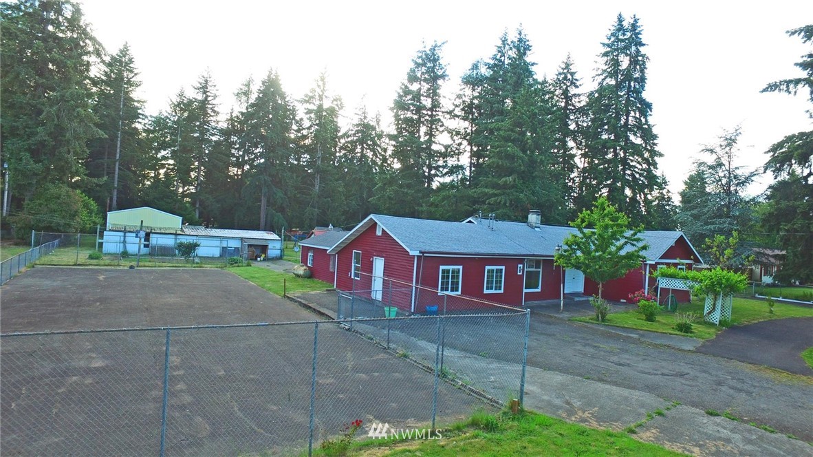 19215 Loganberry Street Southwest Rochester, WA 98579 - Photo 38 of 38 a front view of a house with garden