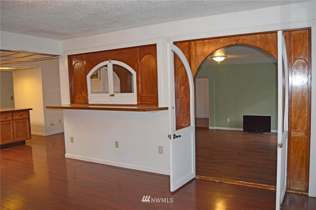 19215 Loganberry Street Southwest Rochester, WA 98579 - Photo 10 of 38 a view of an entryway with wooden floor